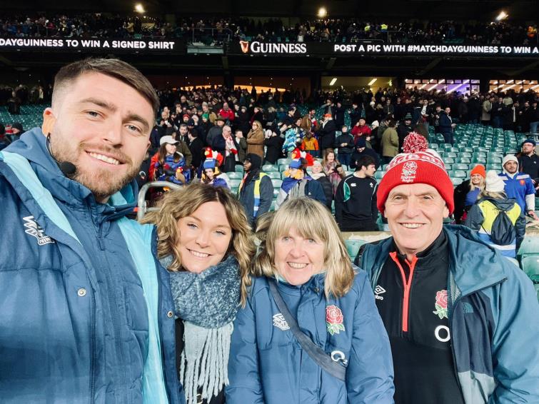 Greg and family at a match